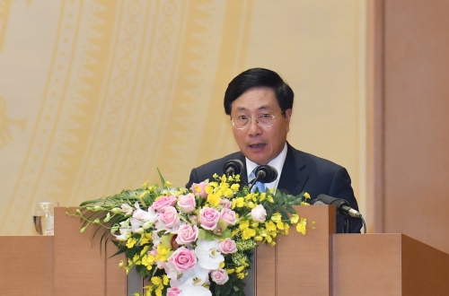 Phó Thủ tướng Phạm Bình Minh trình bày báo cáo kiểm điểm năm 2018 của Chính phủ