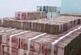 Quan Trung Quốc tham ô 6.000 tỷ đồng, cất giữ 3 tấn tiền mặt trong nhà