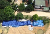 Yêu cầu xã báo cáo hàng trăm tấn xi măng bỏ ngoài trời gây hư hỏng, lãng phí